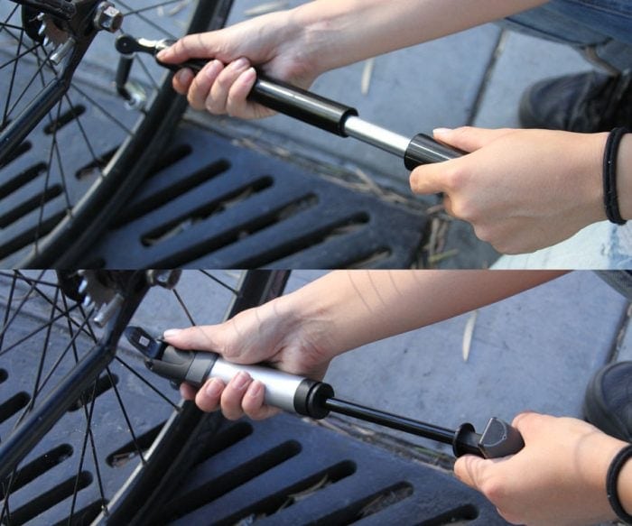 Imagen que muestra una persona hinchando una rueda de bici con una bomba