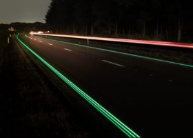 Image of a night road with reflective signs