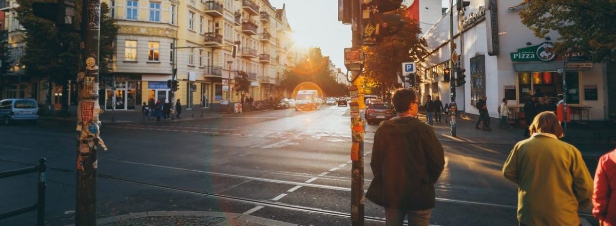 Image of pedestrians waiting to cross a street