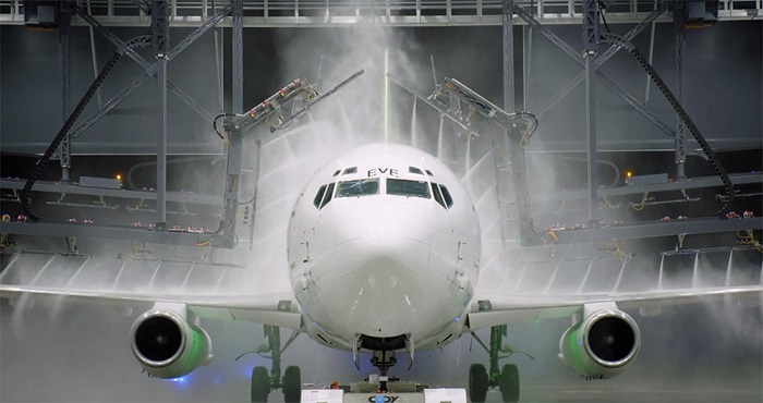 washing a plane in hangar