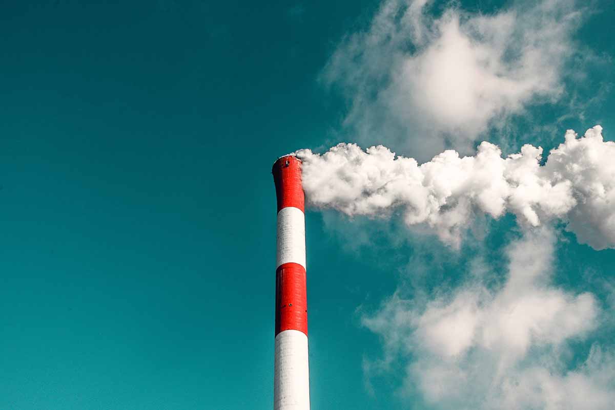 Smokestack releasing greenhouse gases, among other things, into the atmosphere
