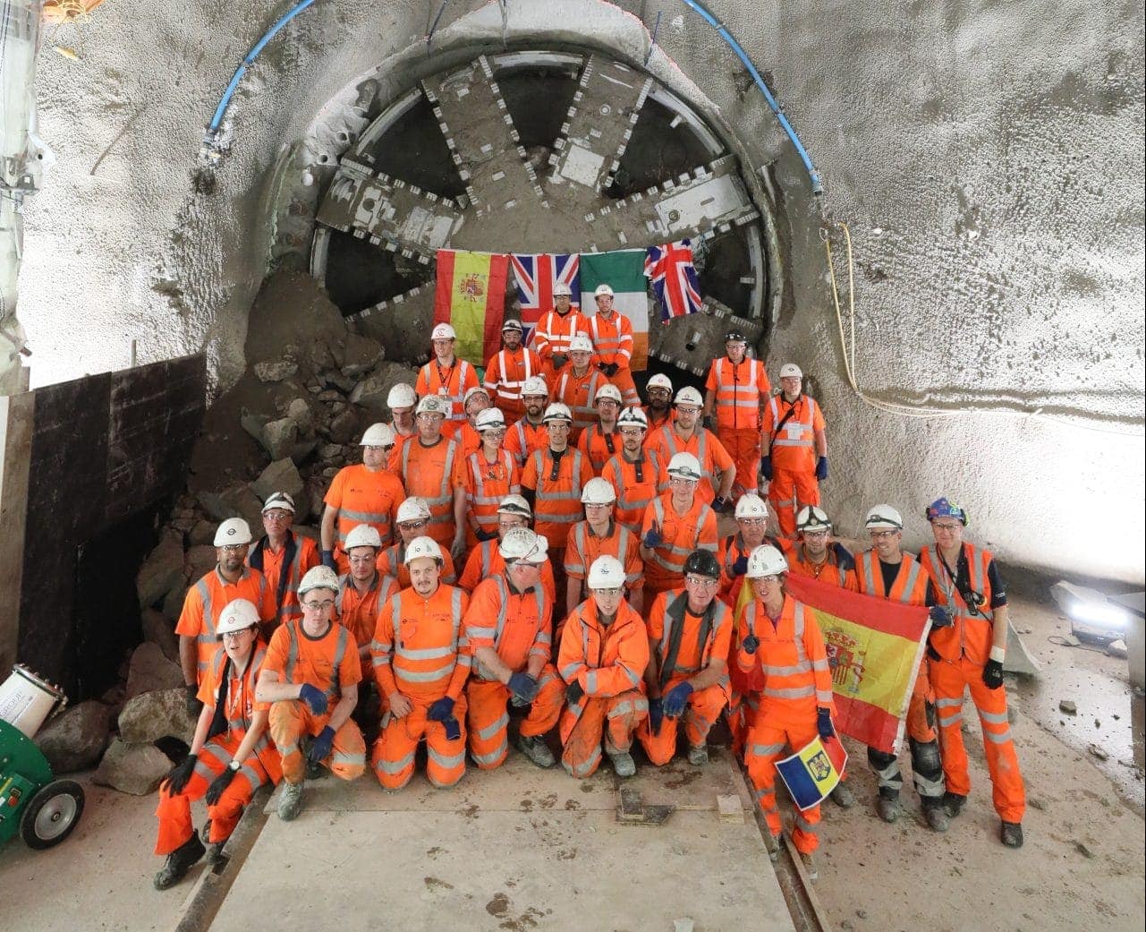 Workers at completion of tunneling for Northern Line Extension