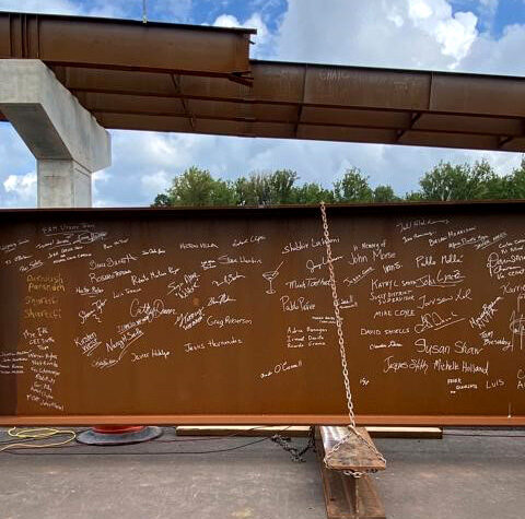 Beam signing ceremony at Transform 66 Outside the Beltway project